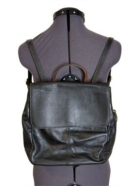 amelia fossil preston leather backpack purse Red Raw Leather BP1993 Convertible design 2 front zip pockets Back zip pocket 2 inner slip pockets 1 inner zip pocket Removable guitar strap Dimensions and Care 14L x 13H x 7D Crafted from high Cameleon® Amelia Concealed Carry Backpack
